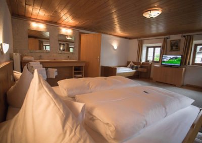 Zimmer mit Doppelbett der Pension
